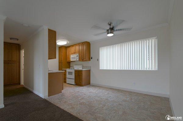 Dining room and kitchen in a 1br 1ba unit