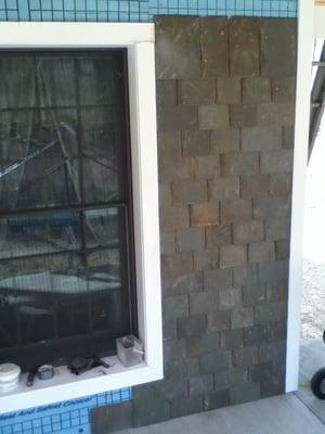 Outside wall replaced with slate.