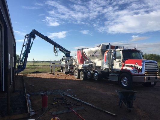 Laying a concrete slab for a workshop.