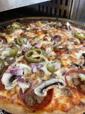 Pepperoni sausage mushroom onion and jalapeño