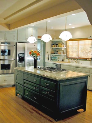 Seafoam blue-green and golden kitchen