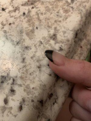 another example where she left nail polish in the corner and didn't clean it up