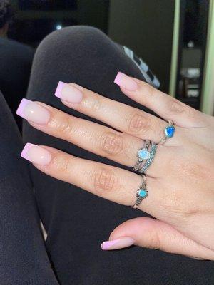 Short pink French tips.