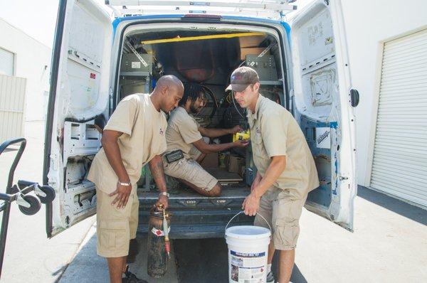 Derrick, Dorian & Andrew loading up truck for the day's installation.