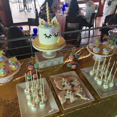 Unicorn cake pops and cookies.