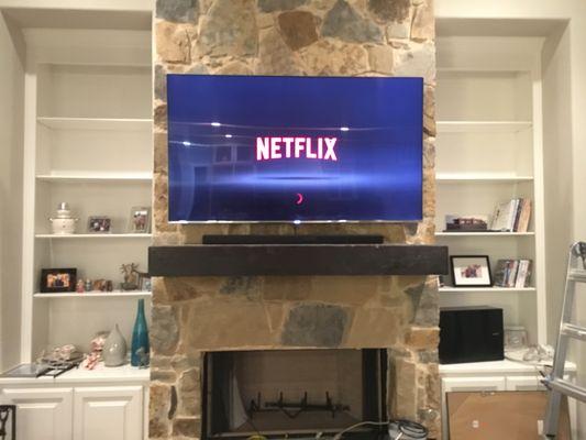 TV over Rock Fireplace