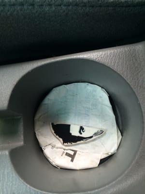 What was left of part of my keychain, in the cup holder