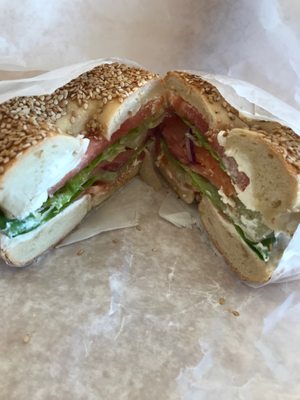 Cream cheese and lox on a sesame seed bagel- yumm!