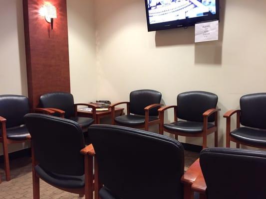 Standard waiting room setup with a TV.