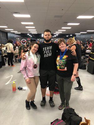 Jon's clients taking first and third at a powerlifting meet