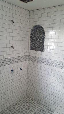 3x5 shower using four textures of tile.