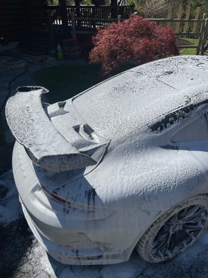 Porsche GT3 dwelling in snow foam