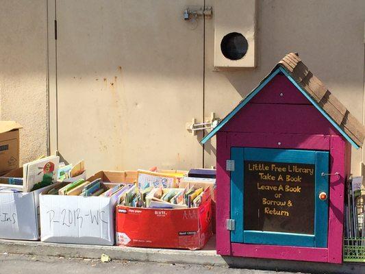 Look at this cutest little lending library I saw while exploring this center!