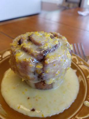 Vegan cinnamon roll with orange glaze