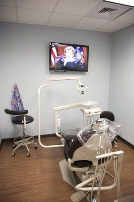 Friendly Dental of Rivergate Dentist office chair and television