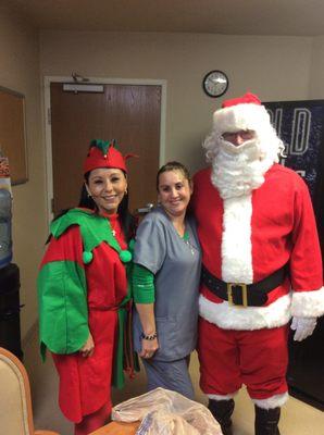 Community Outreach Coordinator, Sylvia Lindloff and Santa himself (Mark Haselden)