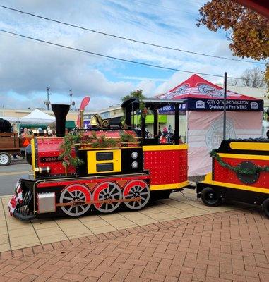 Trackless Train, with horse and carriage rides and the iceless ice rink beyond.