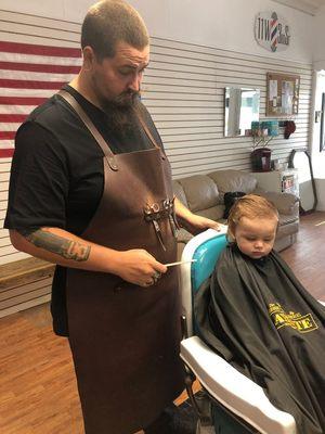 Little man getting in tiptop shape. Ready to slay the ladies at the ice cream stand.