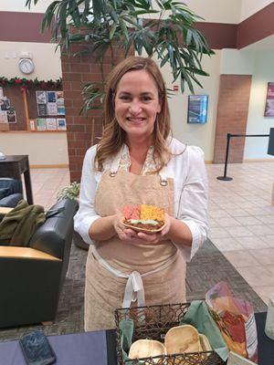 Chef Jen of Plant FARMacy holding a sample of her delicious Morrocan Bean Soup