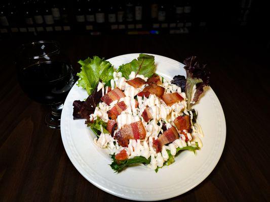 Chicken Bacon Ranch Salad- Chicken, bacon, ranch, tomatoes, mozzarella and spring mix. Served as a big salad or a wrap!