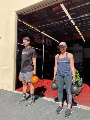 This is my husband and I, being motivated to participate in the #FarmerCarryFebruary challenge.