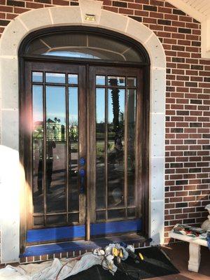 Refinish and stain entry door