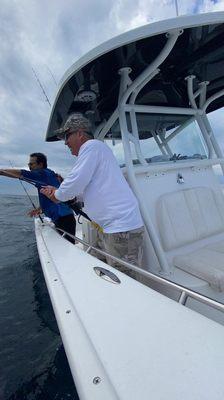 Captain Matt coaching to help reel in the shark!