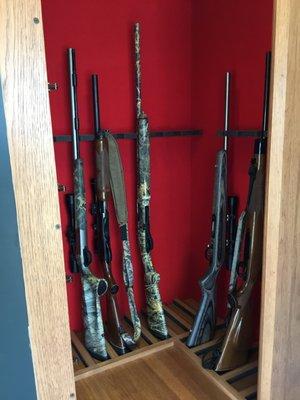 Beautiful curio Cabinets with hidden Gun Cabinets.