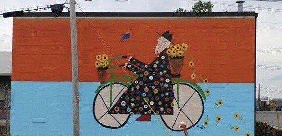 Cyclist with Sunflowers Mural