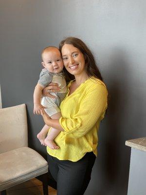 Jess and a happy little patient of Dr. Toms!