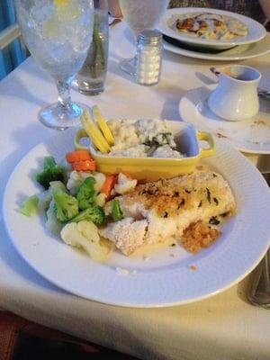 Onion crusted baked cod with spinach risotto and vegetables