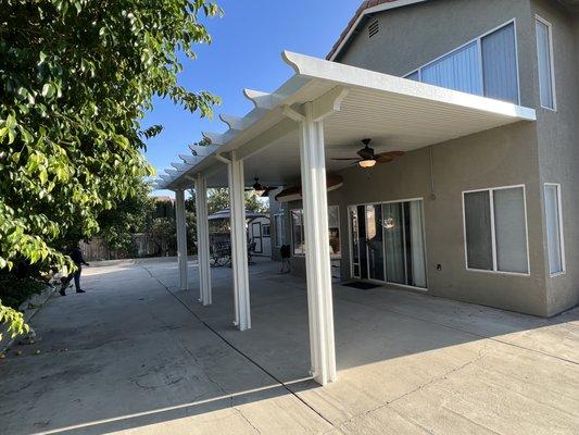 Aluminum patio cover with fans.