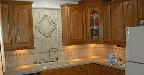 kitchen cabinets and tiling - pic by Mr. Done Right Handyman Contractor of Austin  -   (512) 659-8931 - www.Handyman-Austin.com