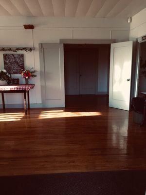 Entrance to main hall with wood floors