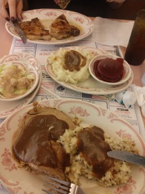 Roast fresh pork dinner and a grilled pork chop dinner.