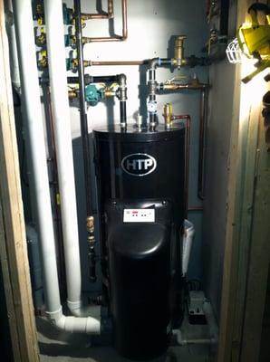 95% efficient HTP condensing boiler in a newly constructed, eleven room house.