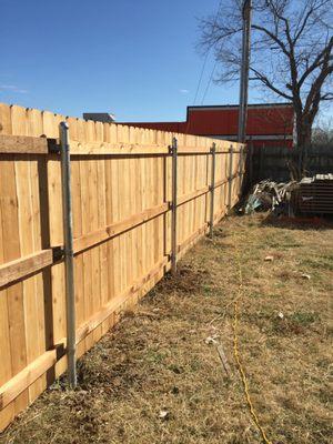 cedar fence with HD 90 2 3/8 sch 40 galvanized post