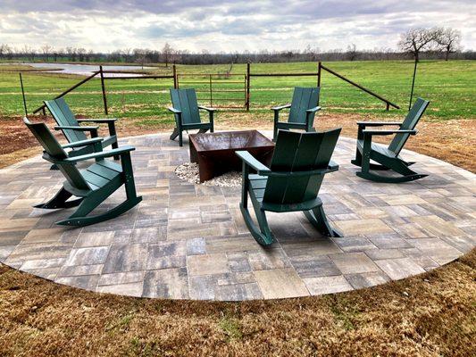 Dimensions 12 pavers, with a beautiful steel firepit in the middle.