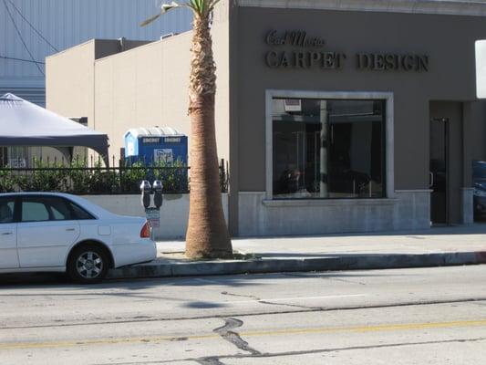 This  new larger showroom is just three doors down(east).