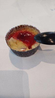 Creme brulee with raspberry sauce