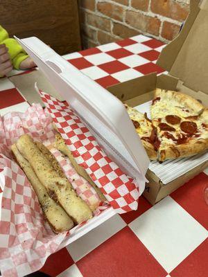 Pizza and garlic herb breadsticks