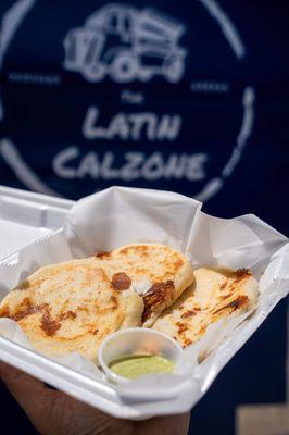 Our arepas with creamy cilantro garlic sauce.