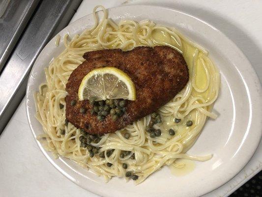 Fresh Pounded Chicken Cutlet hand dusted and sautéed in butter, lemon and white wine. Served with pasta and Caper Sauce