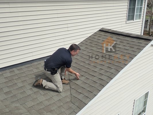 Checking for adhered shingles (random sample)