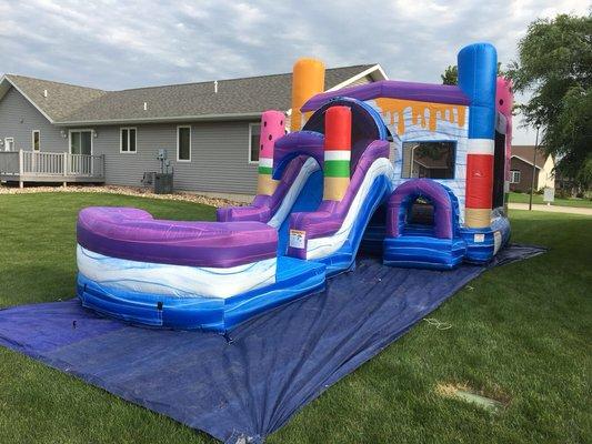 Ice Pops Combo Bounce house with a slide and a splash pool