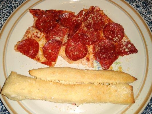 Delicious thin crust pizza and crazy bread! Yum!