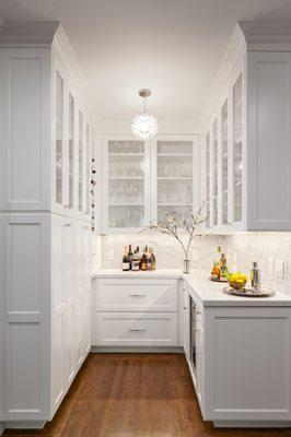 New, white on-white kitchen cabinets installed. A timeless look.