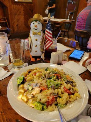 Vegetables.  Brocoli cream.sauce over pasta.