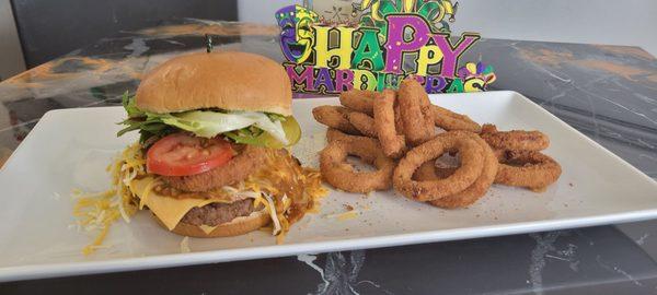 Chili cheese cheeseburger with onion rings