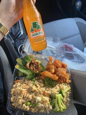 Orange Chicken, Beef & Broccoli, half and half Chicken/Veggie Fried Rice, and a Jarritos Mandarin.